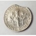 UNITED STATES OF AMERICA 1966 . ONE 1 DIME COIN . ERROR . BITTEN FLAN